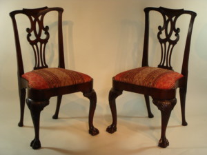 A pair of George II carved mahogany side chairs 