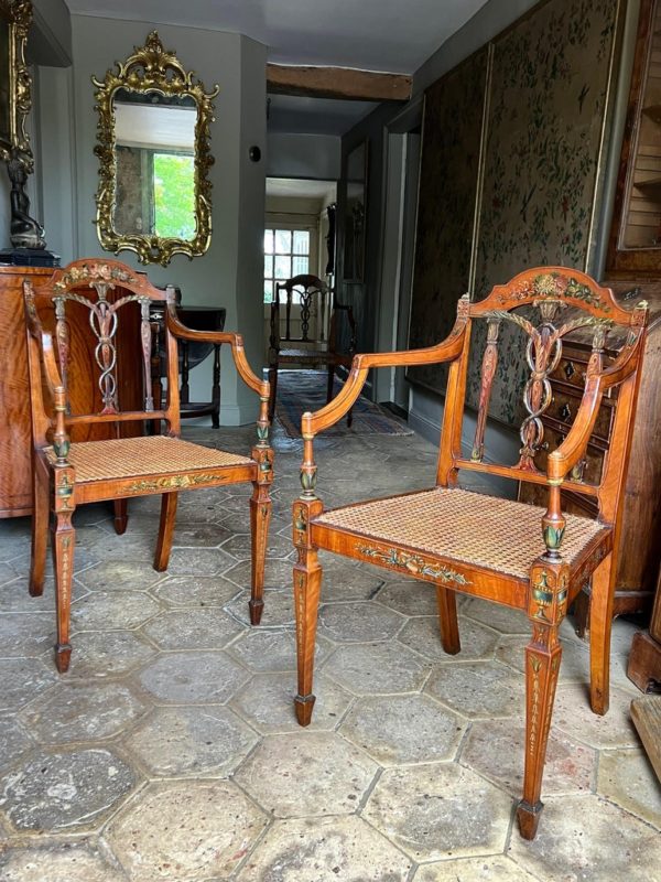 A fine and very rare set of four English late-18th century satinwood painted armchairs attributed to Seddon, Sons & Shackleton, ca 1790.