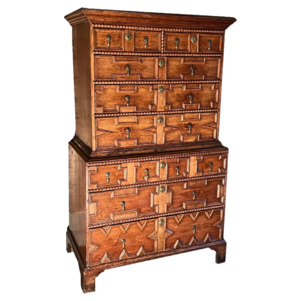 English early-18th century oak geometrically-panelled chest on chest