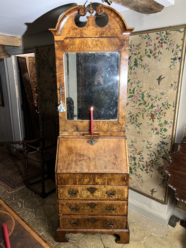 A rare small early-18th century walnut bureau bookcase/ cabinet - front