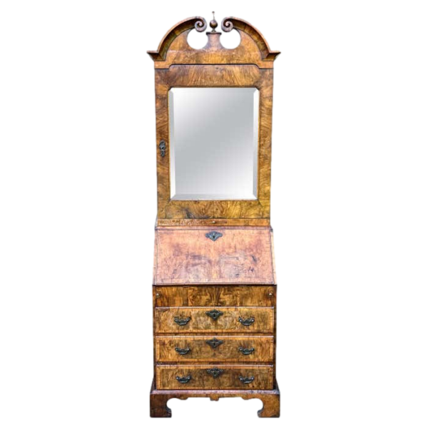 A rare small early-18th century walnut bureau bookcase/ cabinet