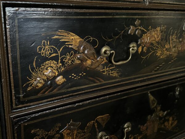 A rare Queen Anne chinoiserie japanned chest on stand side drawer