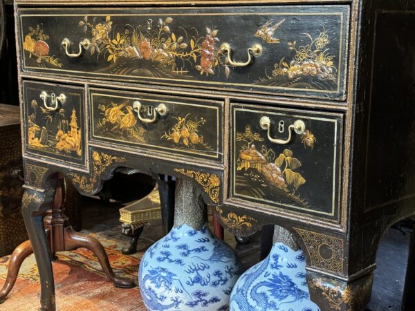 A rare Queen Anne chinoiserie japanned chest on stand bottom drawers