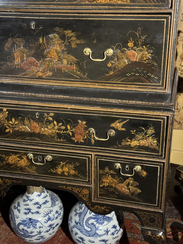 A rare Queen Anne chinoiserie japanned chest on stand bottom