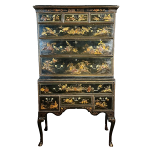 A rare Queen Anne chinoiserie japanned chest on stand
